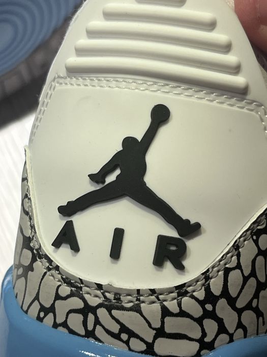 Nike Air Jordan 3 Retro "UNC" sneakers.