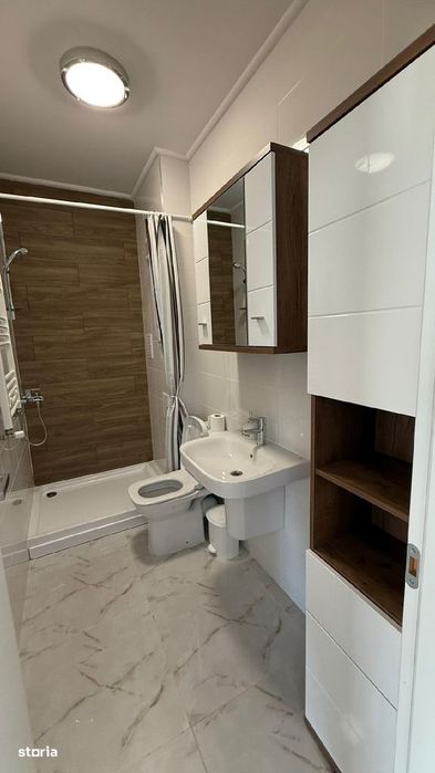 3 camere,2 dormitoare,2 bai, mobilat,utilat,parcare