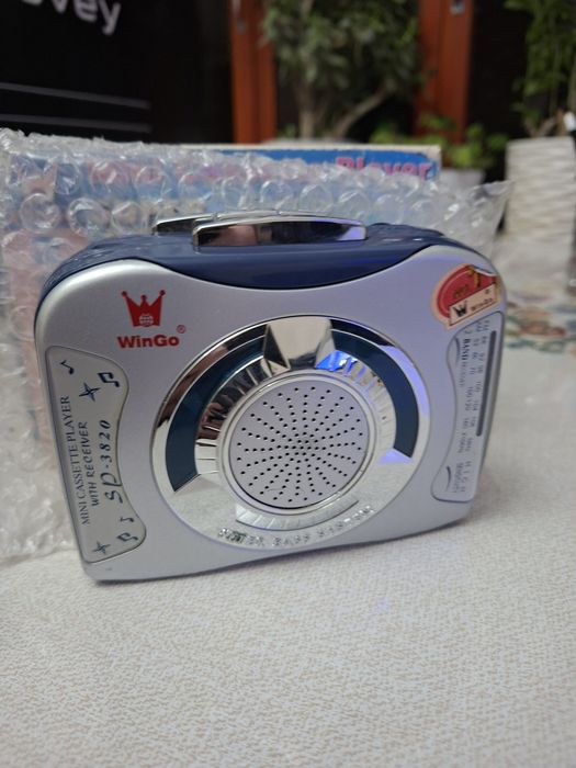 Это мини-кассетный плеер WinGo SP-3820 с радиоприемником.