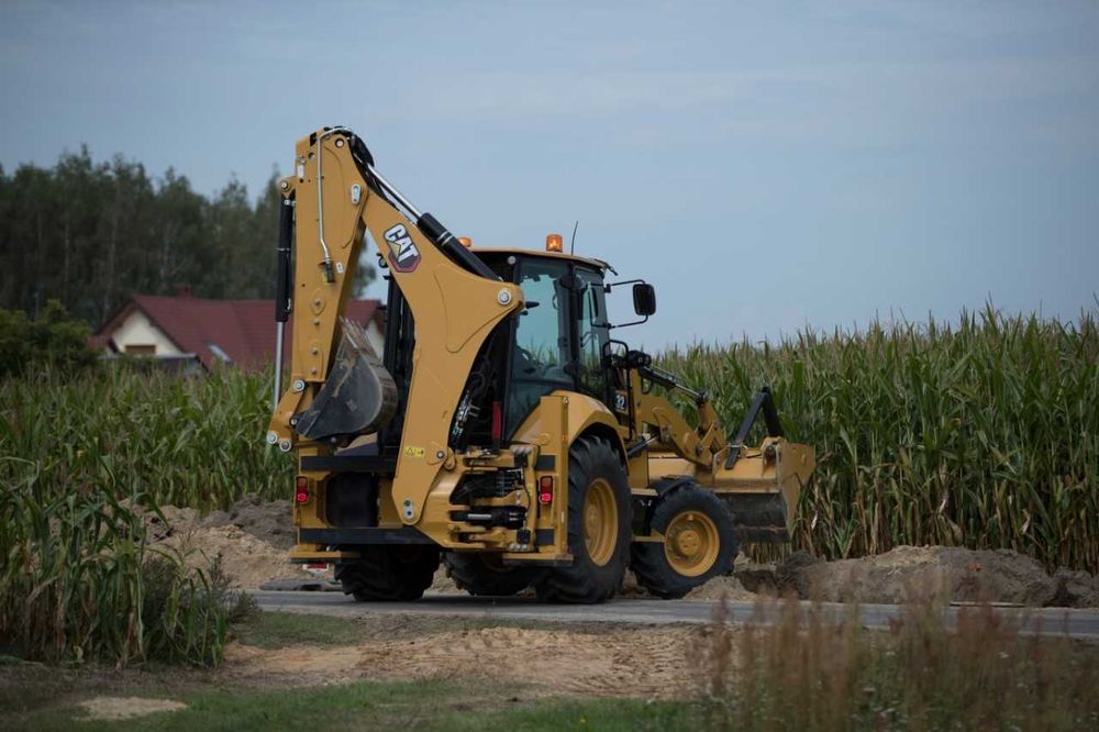 Экскаватор юкловчи CAT432, Экскаватор погрузчик CAT432