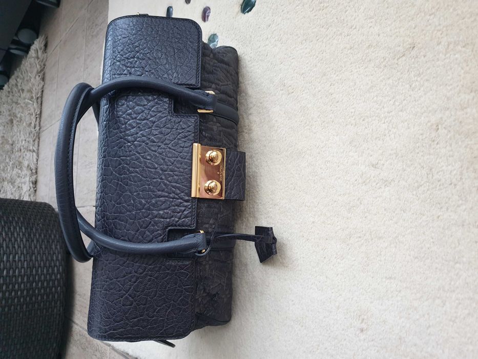 Luis Vuitton poşetă model  Volupte Psyche limited edition.