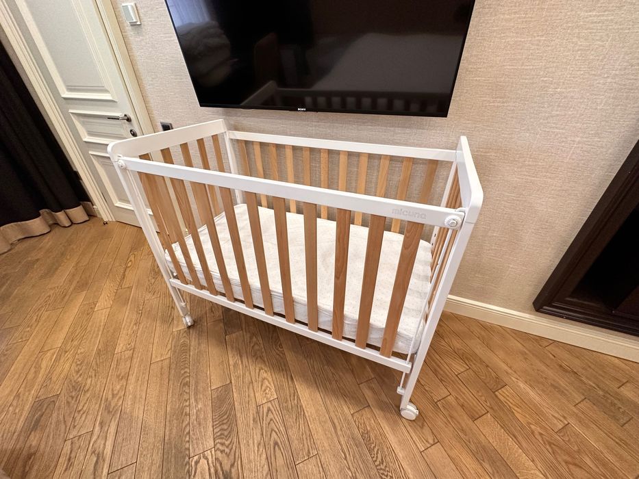 Новый манеж белый.