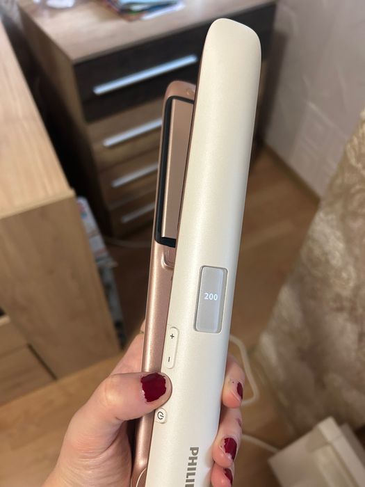 Преса изправяне Philips moisture protect