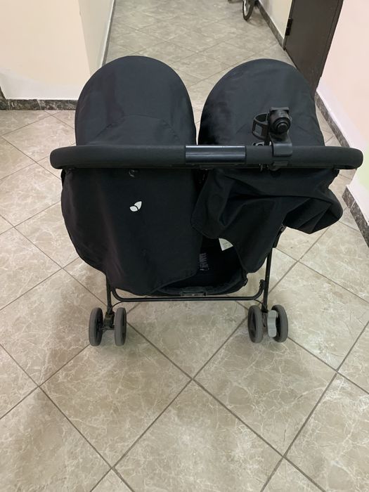 Коляска для двойни (близняшек)