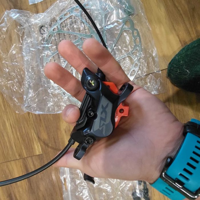 Set Frane Shimano SLX BL-M7100 + BRM7120 - 4 pistoane