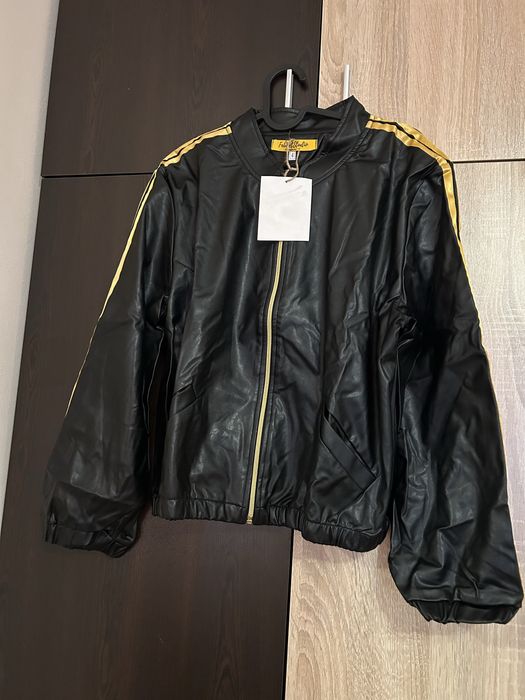 Дамски кожен екип