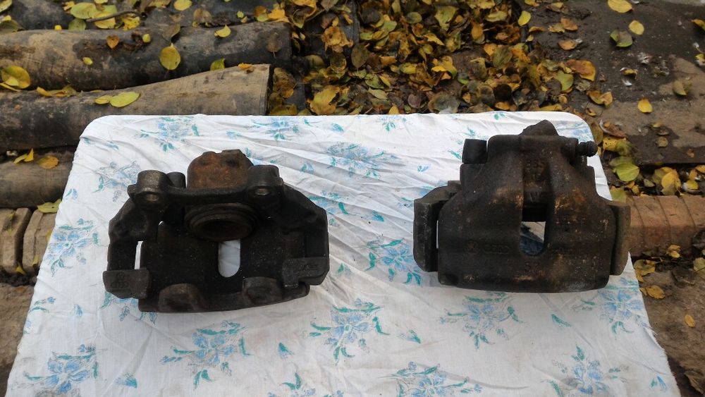 Суппорт AUDI  C4 передний