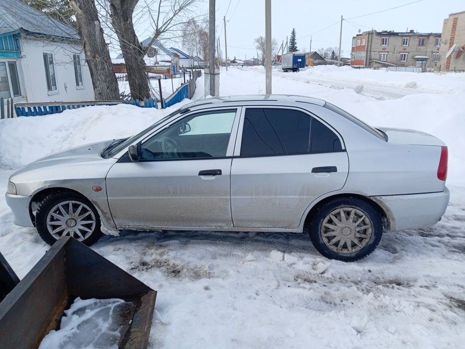 Продам мицубиси лансер.