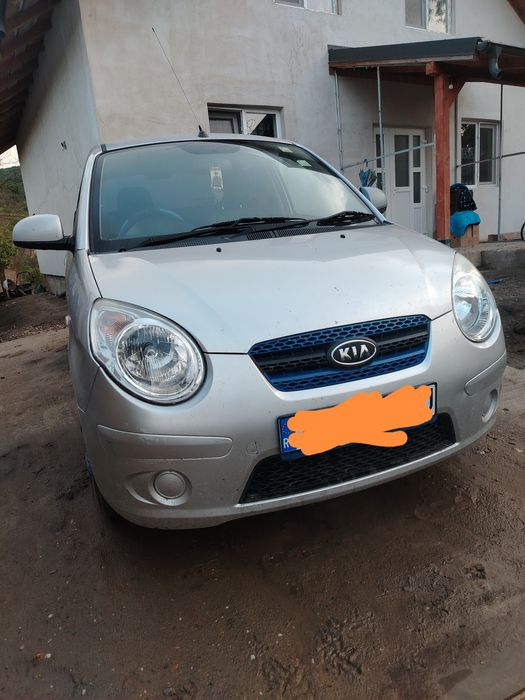 Kia picanto 1 an 2009 dau la schimb cu cros 125