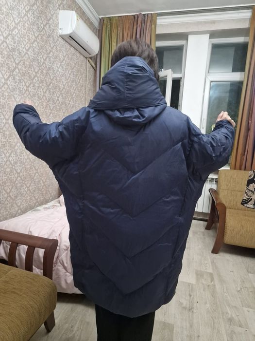 Продам пуховик тёмно-синего цвета