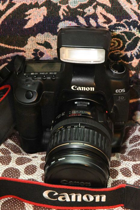 Фотоаппараты Canon - Nikon