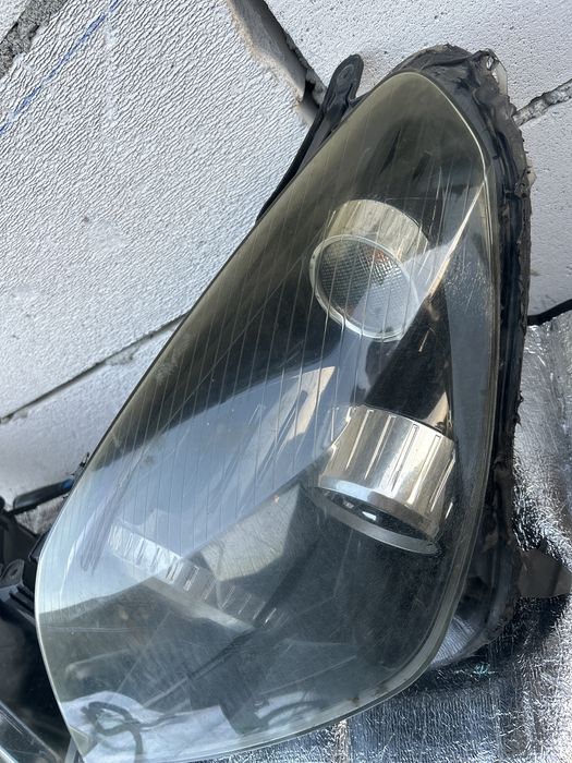 Faruri Xenon Opel Astra H cu mufe incluse .