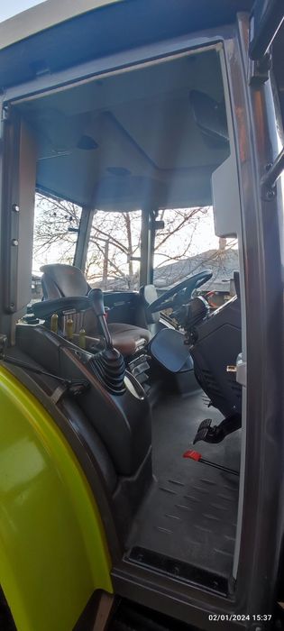 Tractor Claas Ares 577 ATZ + plug