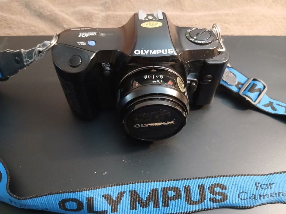 Olympus OM-101 Power Focus + 35-70mm + 70-210mm AF + Blitz T18 – COMPLET