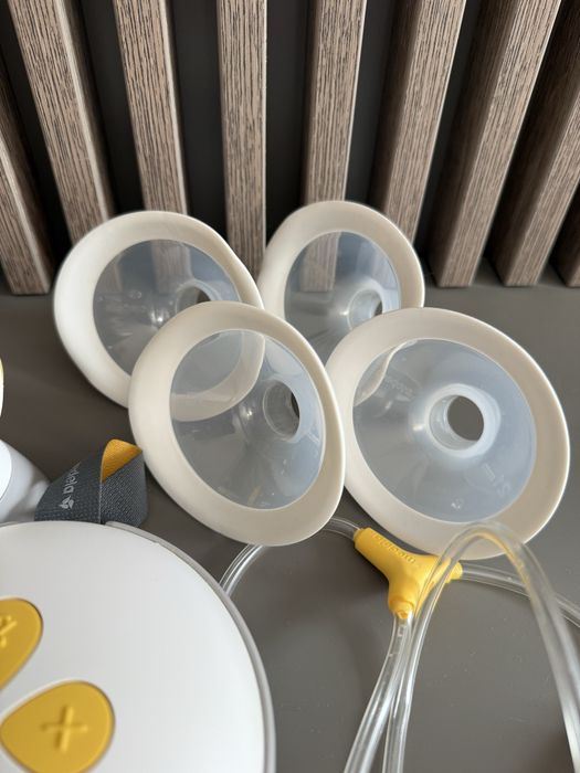 Двойна двуфазна помпа за кърма Medela - Swing Maxi