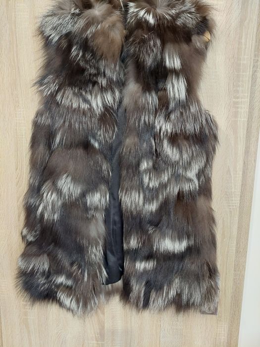 Дамски елеци и палта