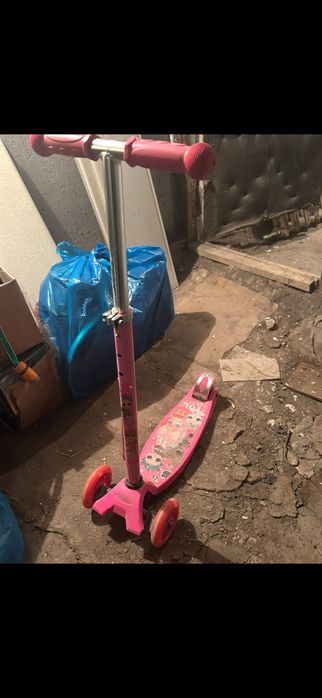 Самокат трёхколёсный