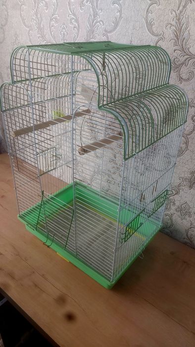 Клетка для попугаев...