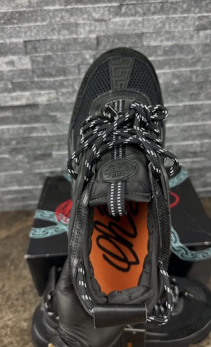 Versace chain reaction