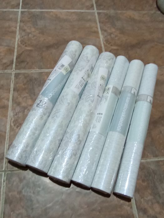 Обои двухслойные 6 рулонов.