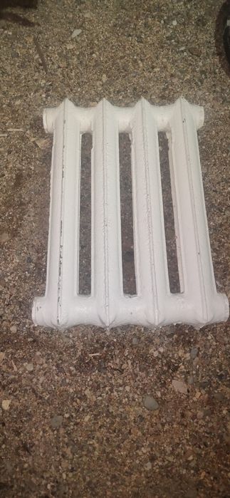 Батарея радиатор отопления чугунный