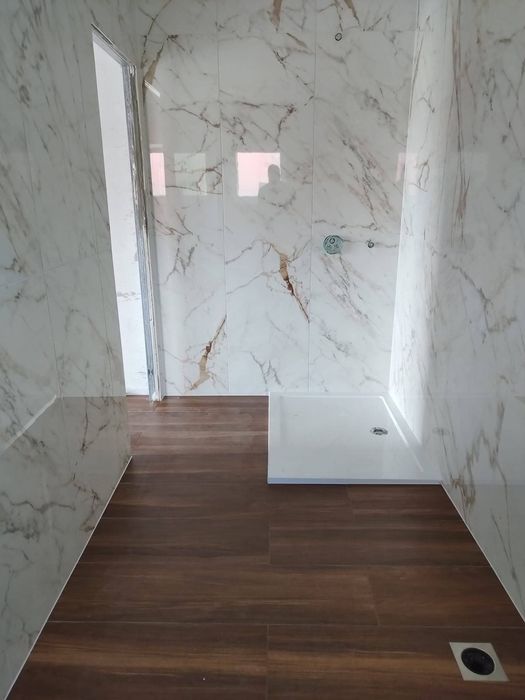 Meserias constructii efectuez lucrari in constructii  apartamente la cheie gresie faianta glet lavabila sape tencuieli etc.