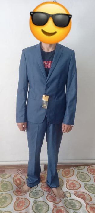 Продам новый костюм