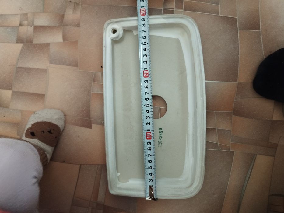 крышка от сливного бочка