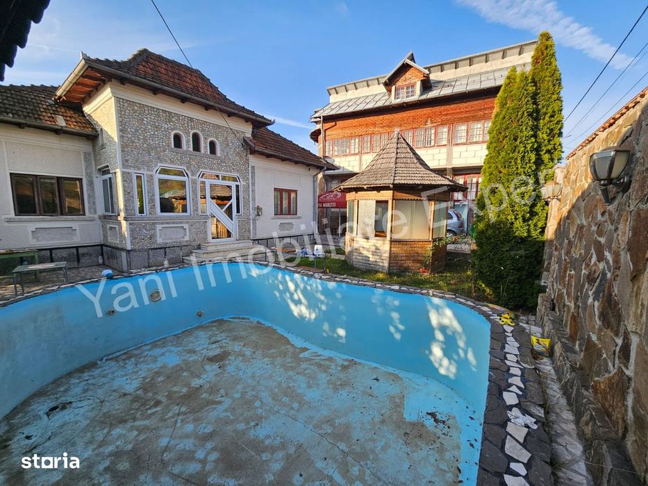 Casă + spațiu comercial de vânzare în comuna Băiculești, județ Argeș.