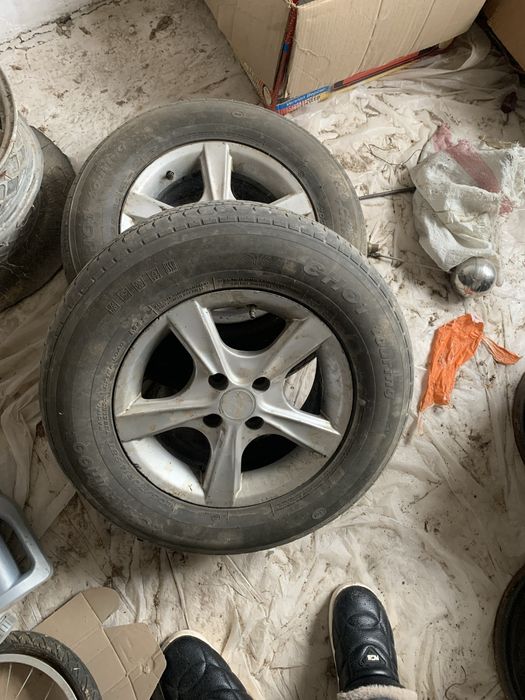 Диска балон сотилади урта холатда размери 14  нексия жугули мошиналарг