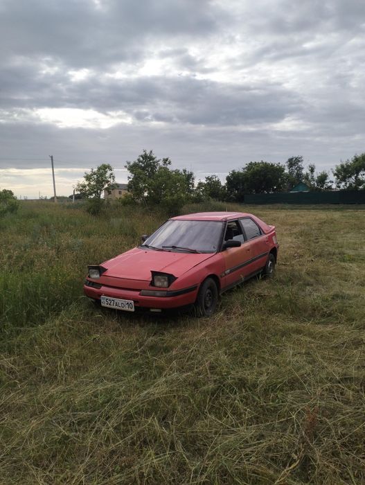 Продам машину Мазда 323