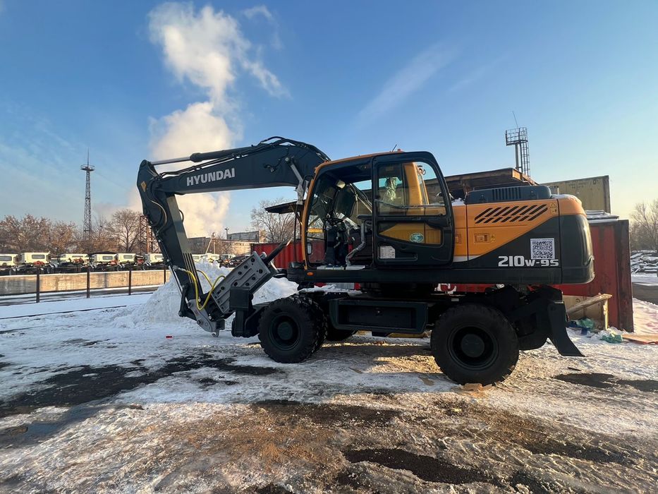 Колесный эсковатор