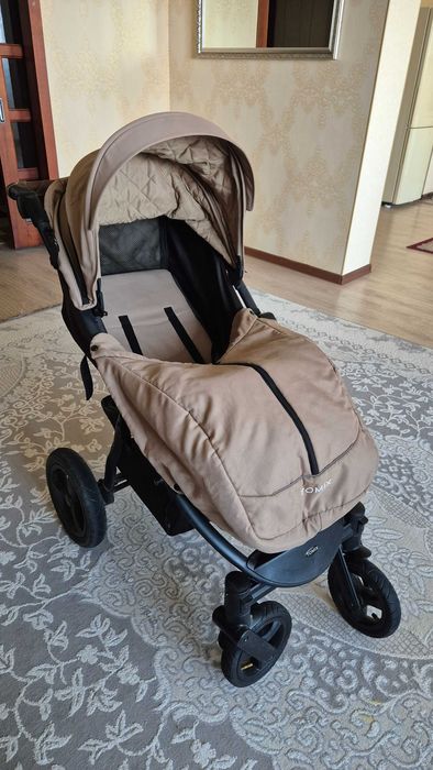 Продам  Б/У коляску TOMIX (всесезонная). Астана