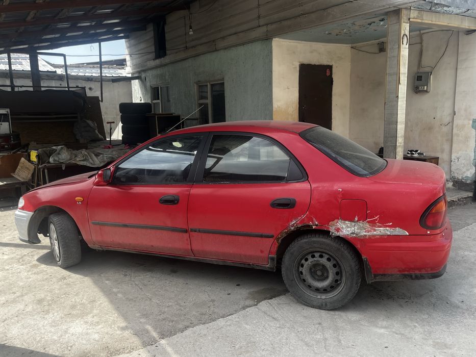 продам машину Мазда 323