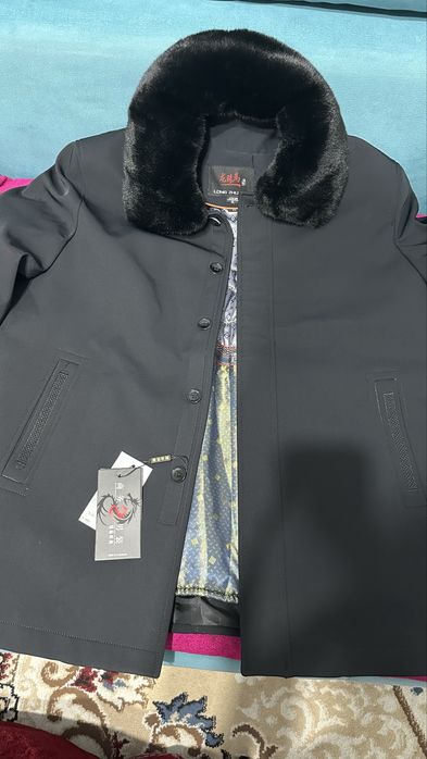 Мужкой куртка новый