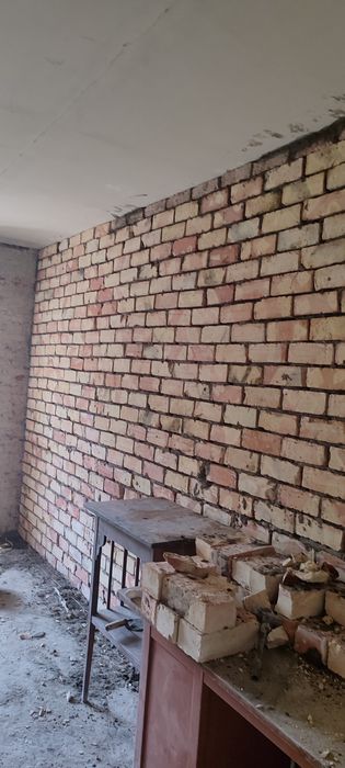 Мастер по кладки кирпича