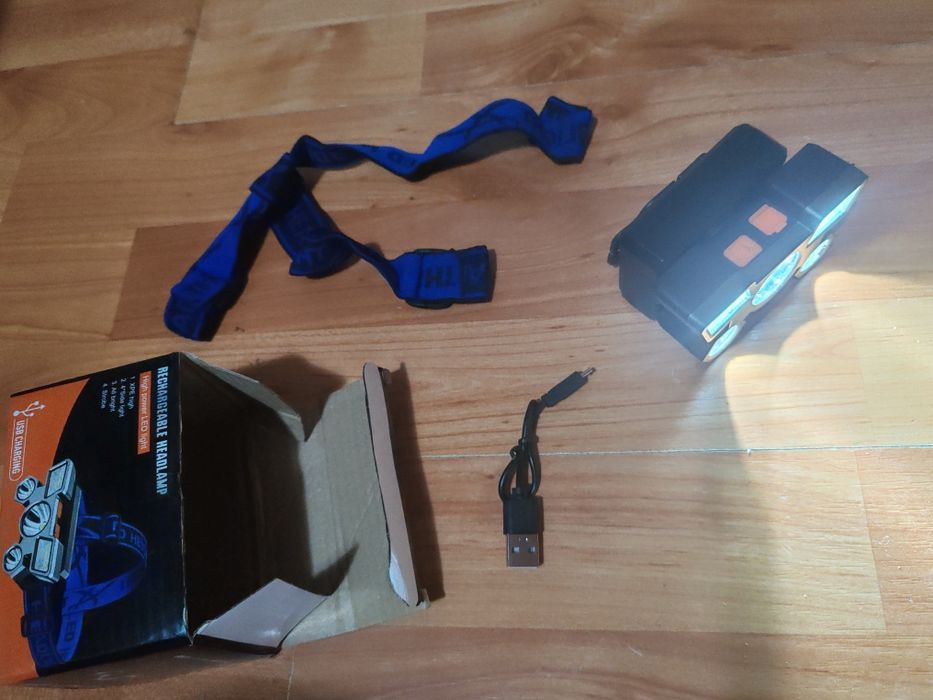 Lanterna de cap cu acumulator si încărcător