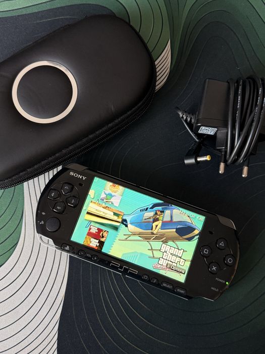 PSP 3001 modat Ark4  50 jocuri 64gb