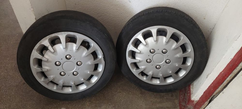 Set 4 jante tabla cu anvelope de vara si capace