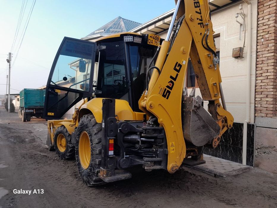 Экскаватор погрузчик Volvo SDLG