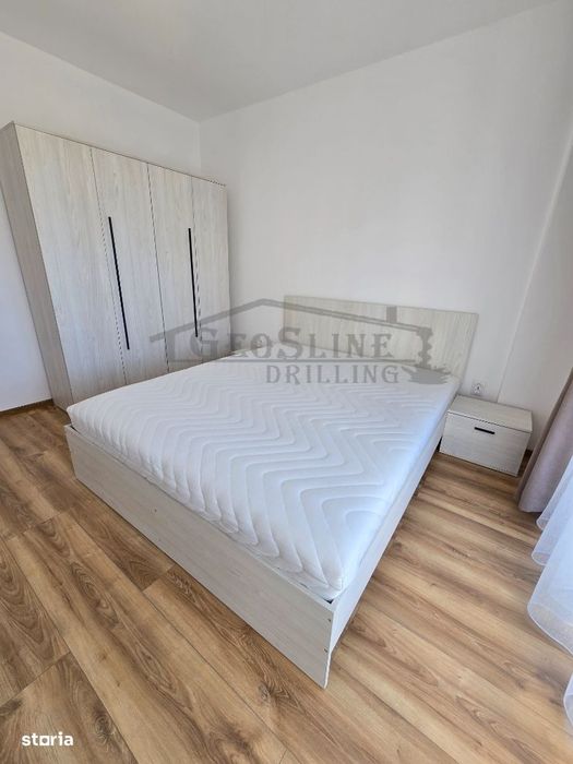 Apartament 2 dormitoare 1 open-space Parcare subterană privată inclusă