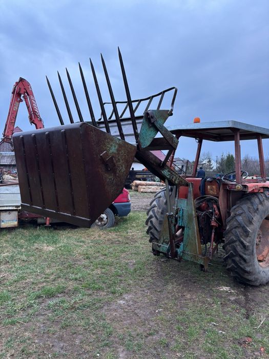 Încărcător în tirant