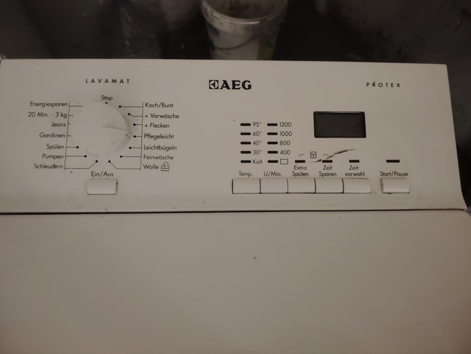 Пералня с горно зареждане AEG