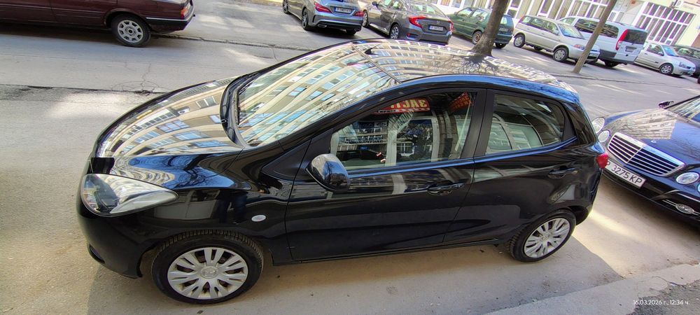 Mazda 2  бензин 1.35