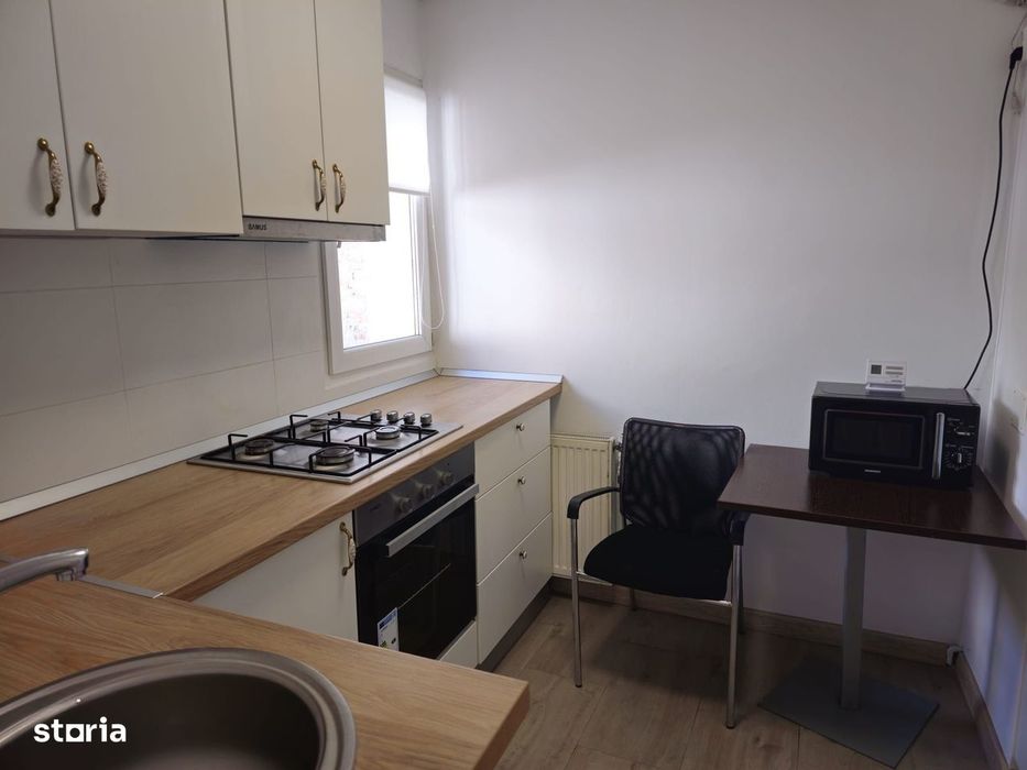 Casa finisata la curte comuna, 56 mp, 2 camere - zona Centrala