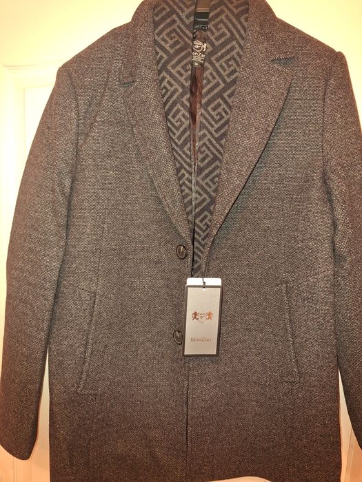 Продам новое пальто