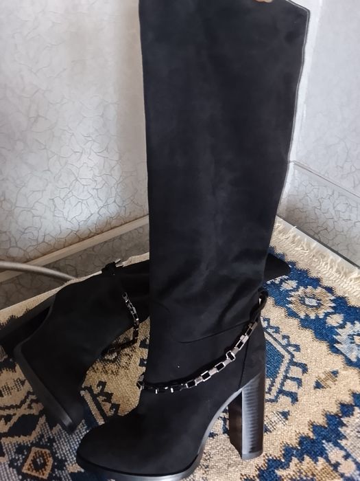 Продам сапоги новые