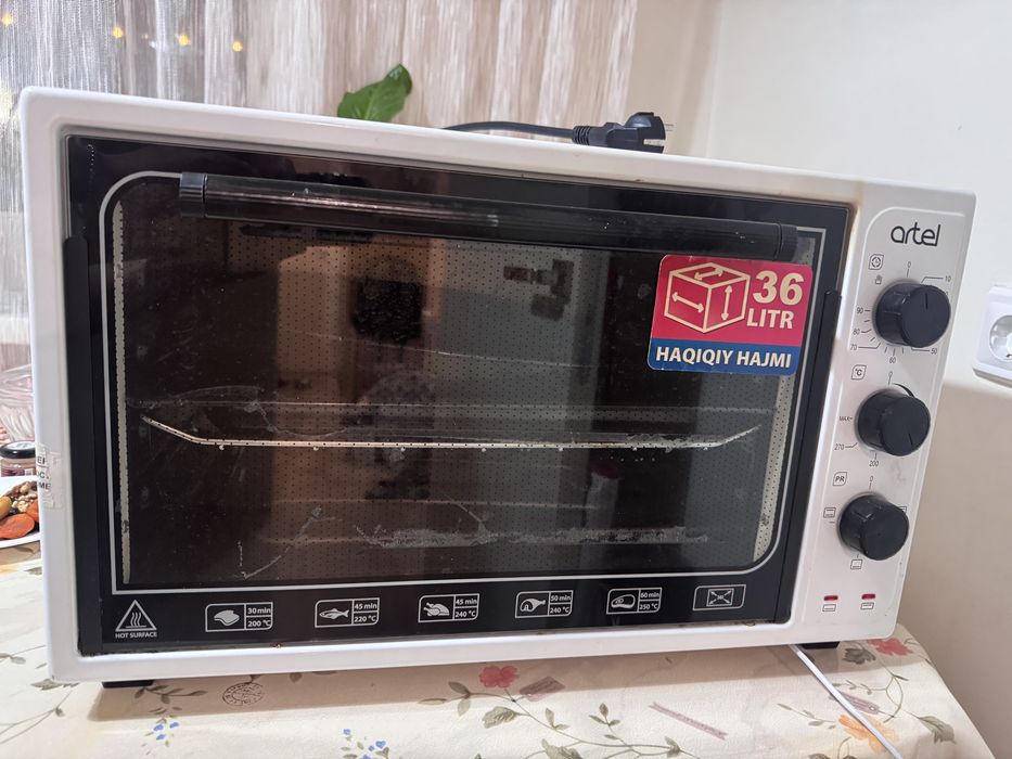Продам духовку (настольная) Artel