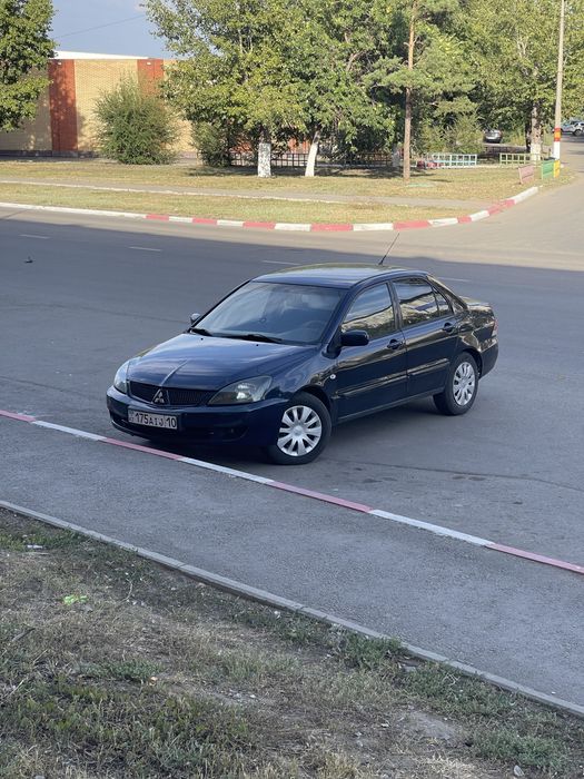 Продам машину Лансер 9