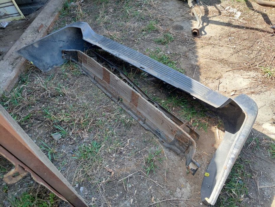 Задний бампер  на LC100